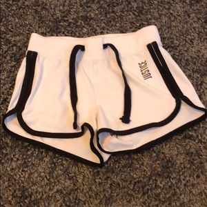 White and black justice shorts 6/7 youth